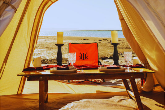 Silla de playa plegable premium KTK Kontiki en color naranja, perfecta para picnic chic frente al mar .Diseño elegante y portátil para disfrutar del lujo al aire libre con estilo y comodidad.